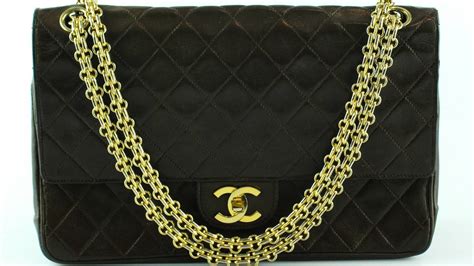 coco chanel borsetta di pelle rivoltata 1955|Coco Chanel 1955 purse.